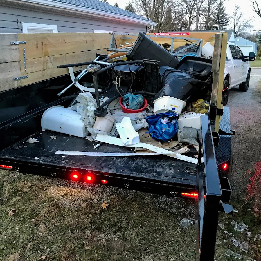 Roll-off dumpster delivered to a residential driveway in South Blooming Grove