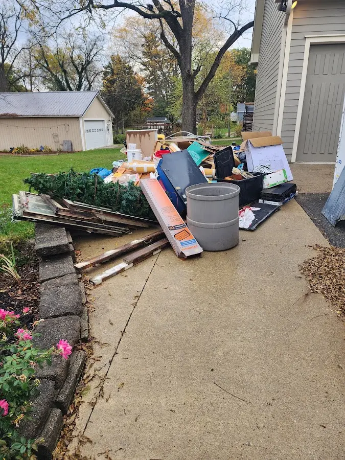 Dumpster being loaded with debris for Commercial Dumpster Rental in South Blooming Grove